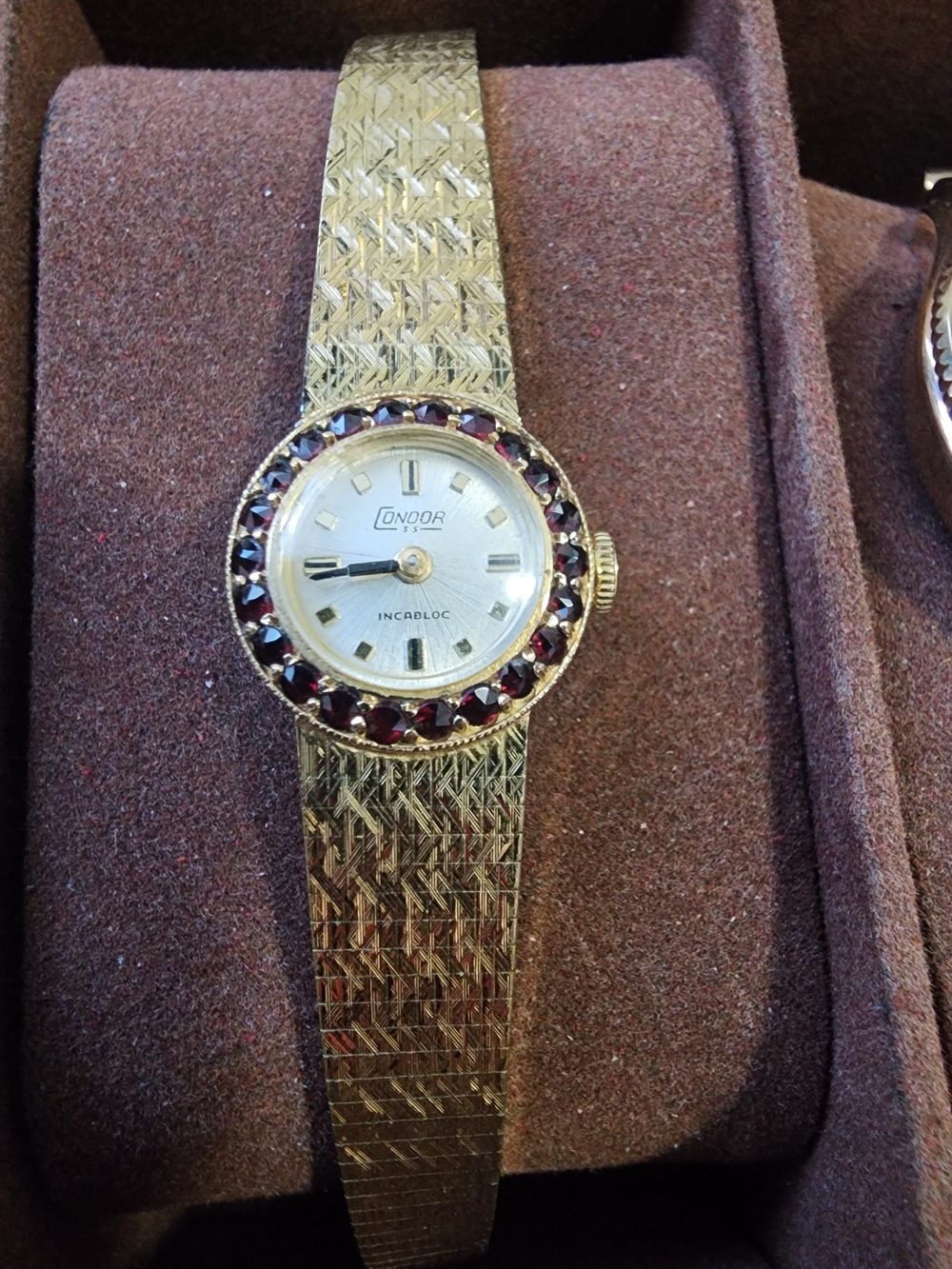Condor 35 Incabloc Gold-Tone Women's Bracelet Watch with Garnet Bezel